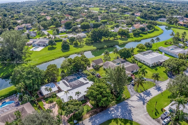 bird's eye view with a water view