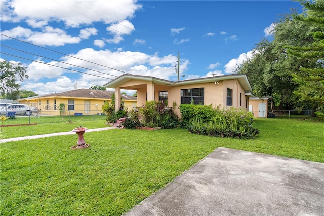 view of front of property with a front lawn