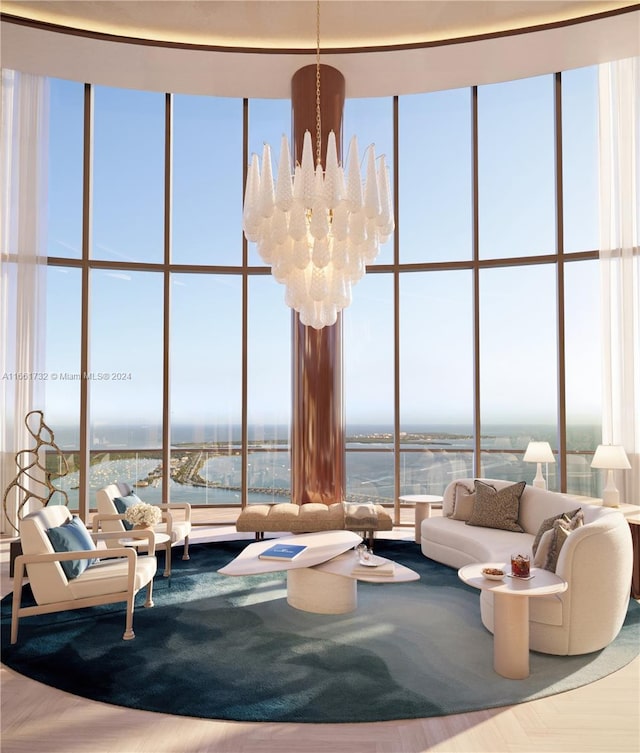 living room with an inviting chandelier, floor to ceiling windows, and a healthy amount of sunlight