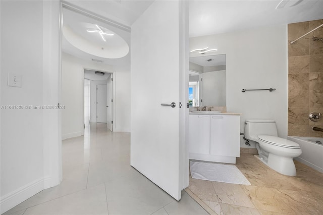 full bathroom with tile patterned floors, vanity, toilet, and tiled shower / bath