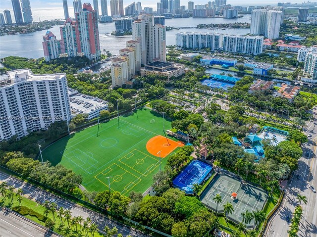 birds eye view of property with a water view