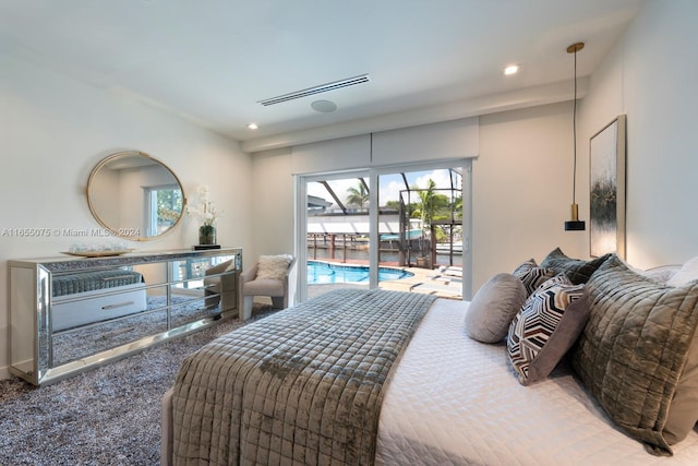 carpeted bedroom featuring access to exterior