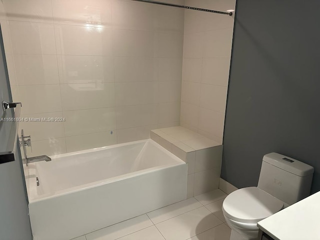 bathroom with tile patterned floors, vanity, and toilet