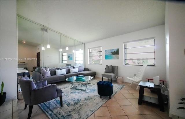 living room with light tile patterned flooring