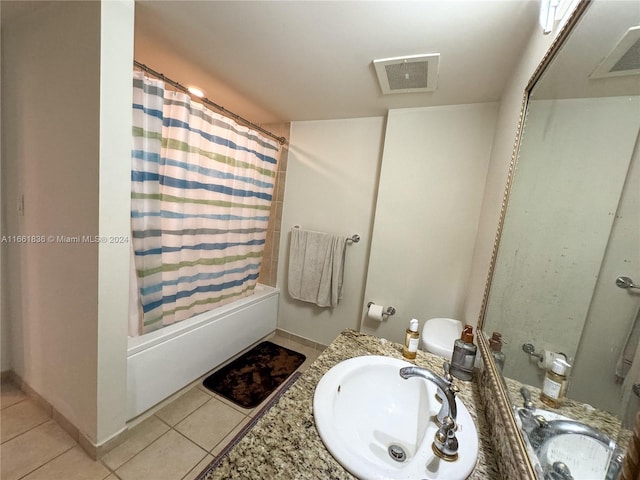 bathroom featuring shower / tub combo with curtain, vanity, and tile patterned flooring