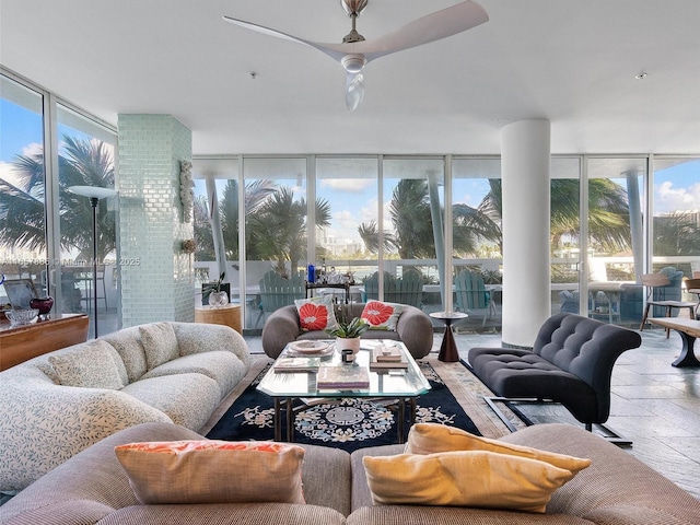 sunroom featuring ceiling fan