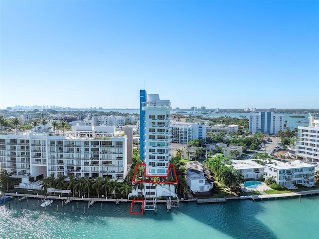 bird's eye view with a water view