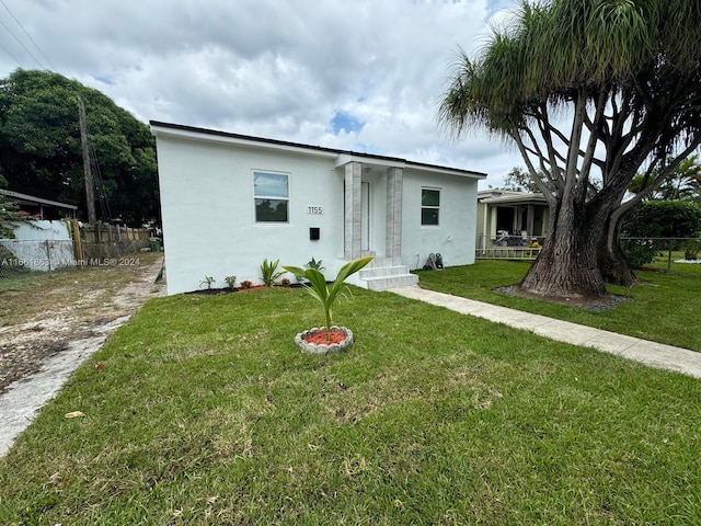 view of front of house with a front yard