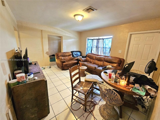 living room with light tile patterned flooring