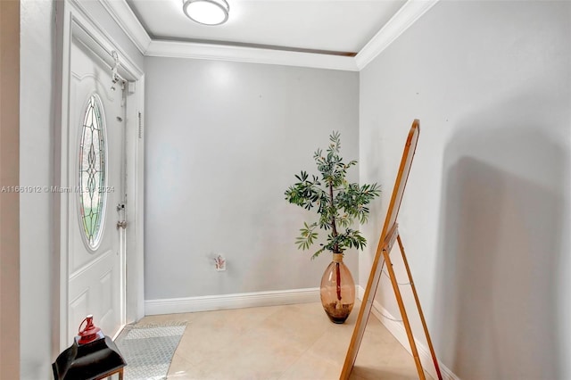 tiled foyer entrance with ornamental molding