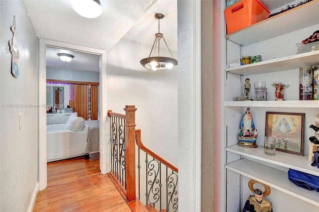 hall with light hardwood / wood-style flooring