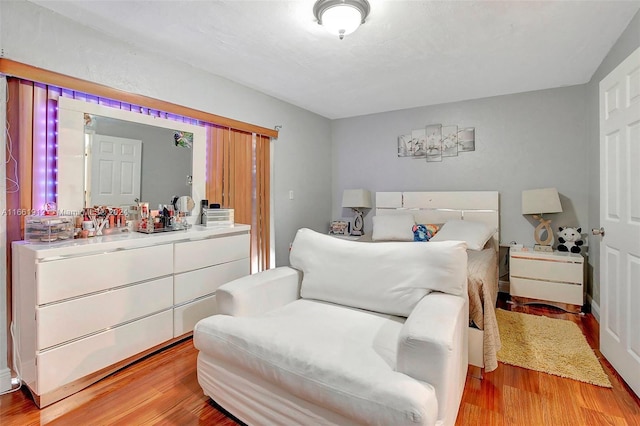 bedroom featuring light wood-type flooring