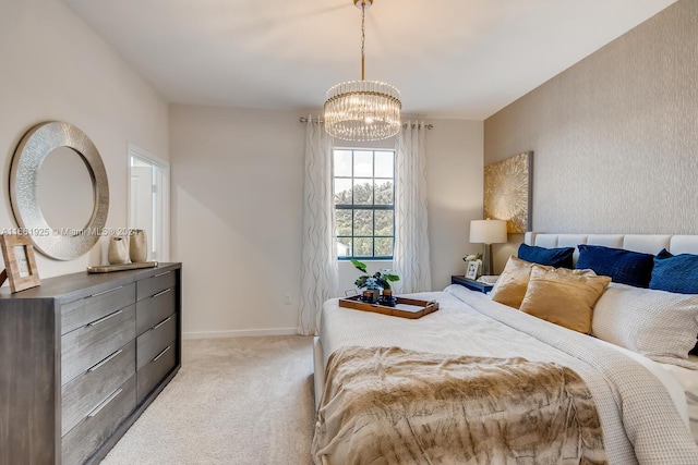 bedroom with light carpet, baseboards, and a notable chandelier