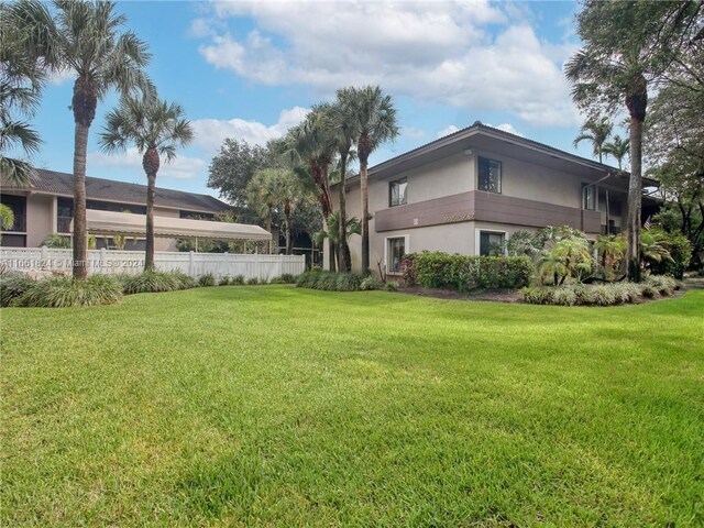 9549 NW 2nd Pl Unit 1-C, Coral Springs, FL 33071 - view of yard featuring fence