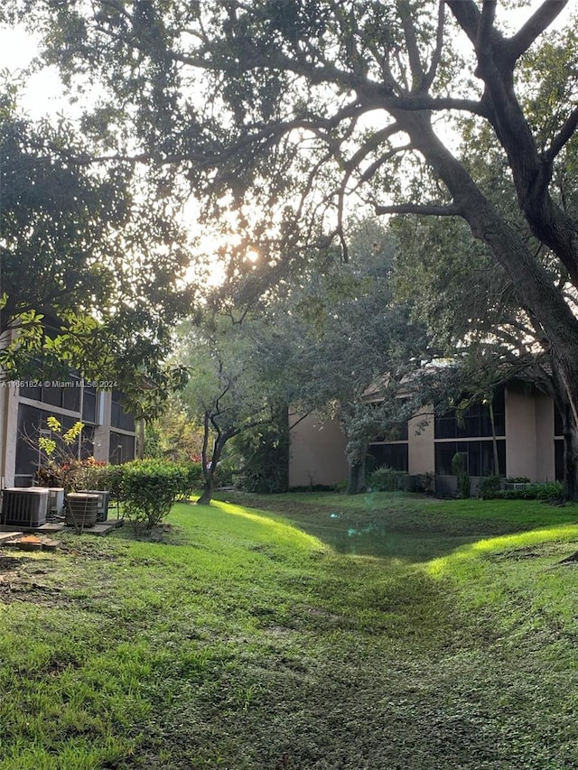 view of yard featuring central AC unit