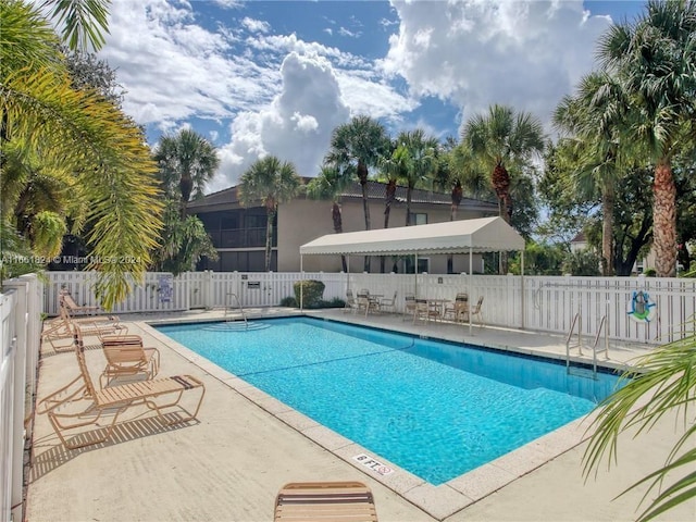 view of swimming pool featuring a patio