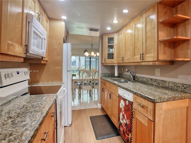 9549 NW 2nd Pl Unit 1-C, Coral Springs, FL 33071 - kitchen with a sink, white appliances, recessed lighting, light wood-type flooring, and visible vents