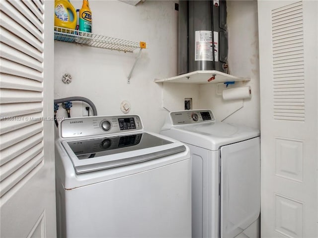 laundry area with independent washer and dryer