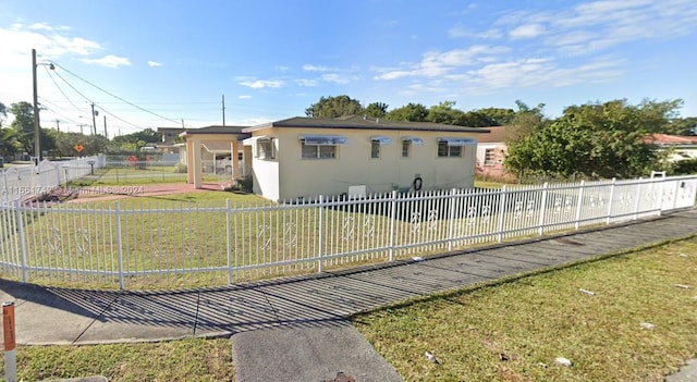 exterior space with a lawn