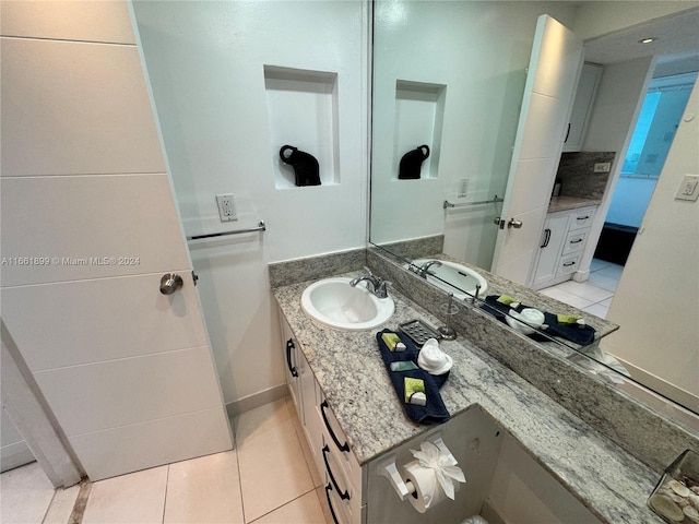 bathroom with vanity and tile patterned floors