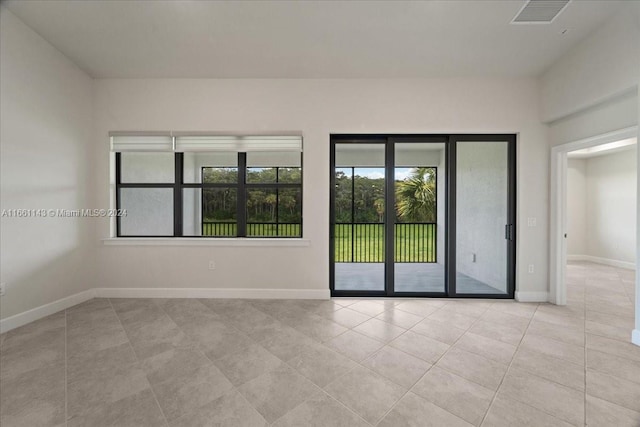 view of tiled spare room