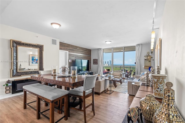 dining room with hardwood / wood-style flooring