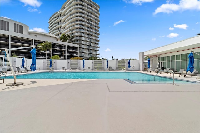 view of swimming pool featuring a patio