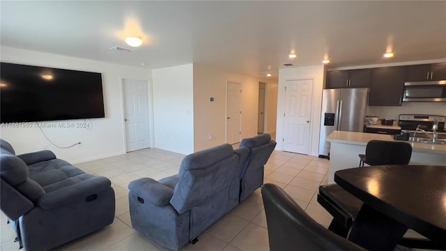 living room featuring light tile patterned floors