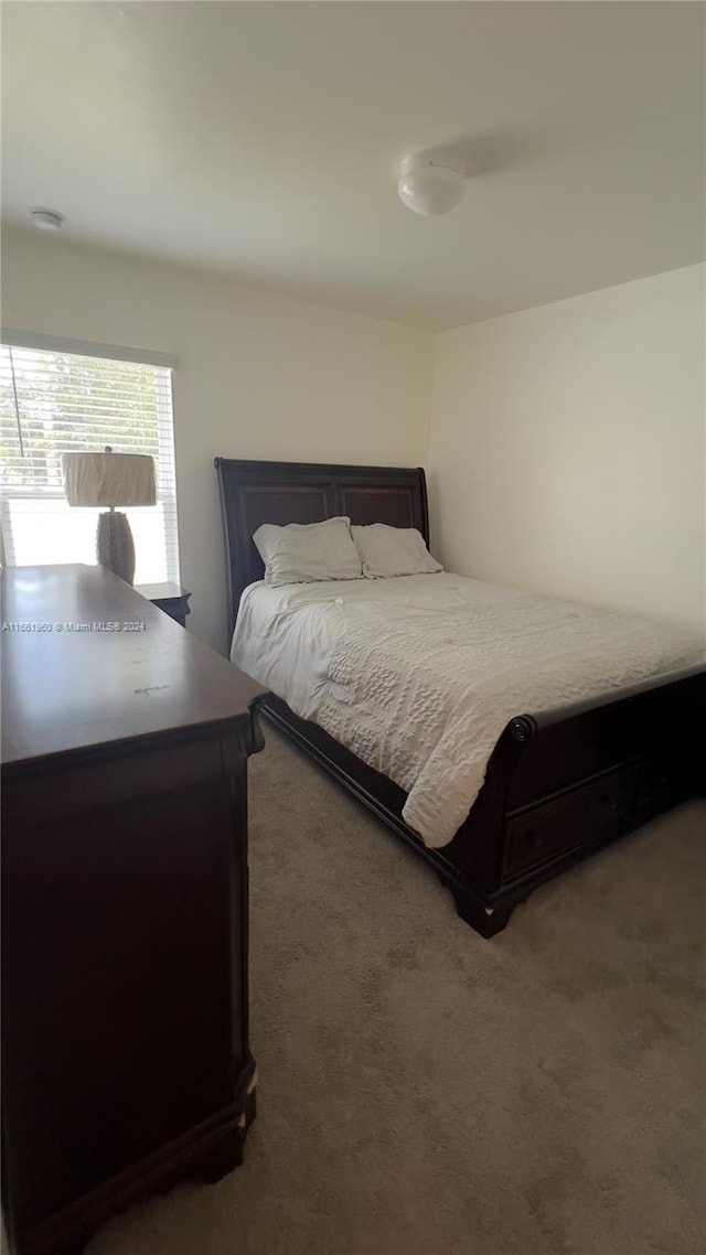 bedroom featuring carpet flooring