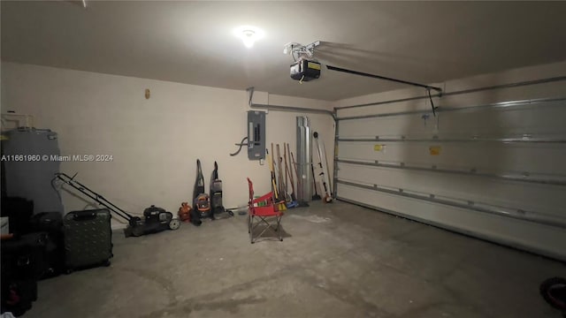 garage with electric panel and a garage door opener