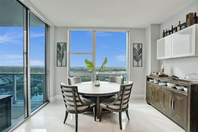 dining room with light tile patterned floors