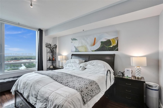 bedroom featuring dark hardwood / wood-style floors