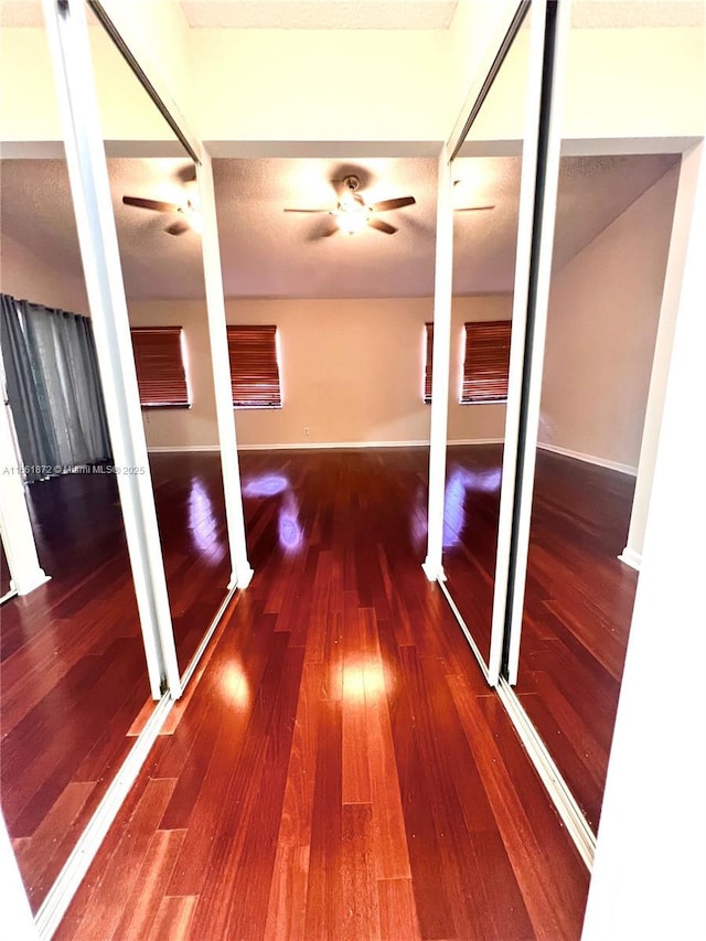 hallway featuring hardwood / wood-style floors