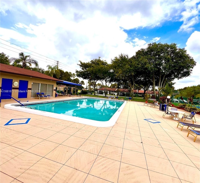 view of pool with a patio