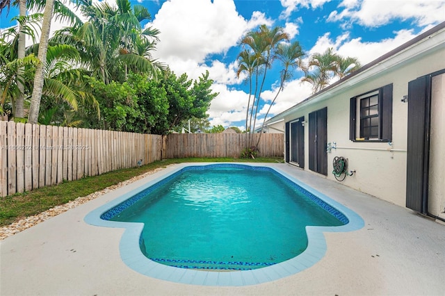 11533 SW 59th Ct, Cooper City, FL 33330 - view of swimming pool featuring a fenced backyard