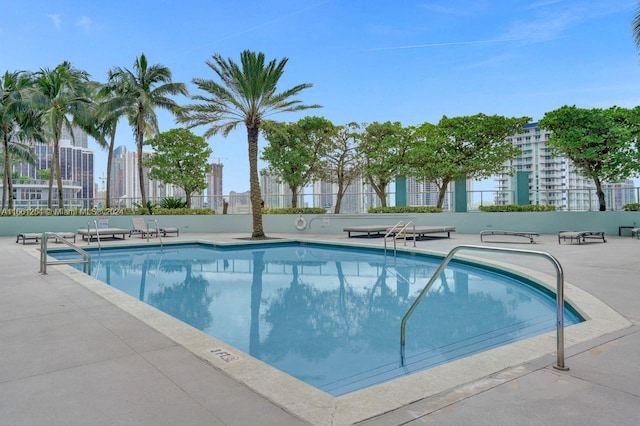 view of pool featuring a patio