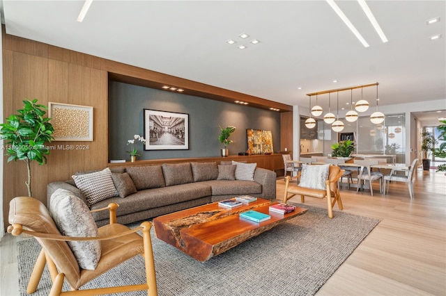 18975 Collins Ave Unit 4502, Sunny Isles Beach, FL 33160 - living area featuring light wood-style floors, wood walls, and recessed lighting
