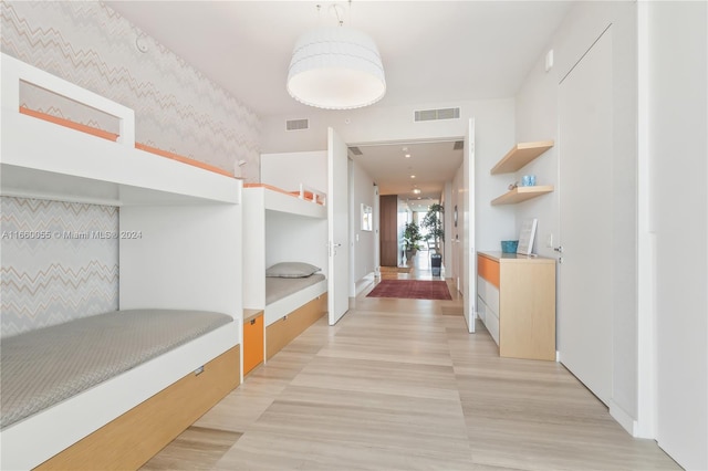 bedroom featuring light hardwood / wood-style flooring