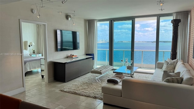 living room with floor to ceiling windows