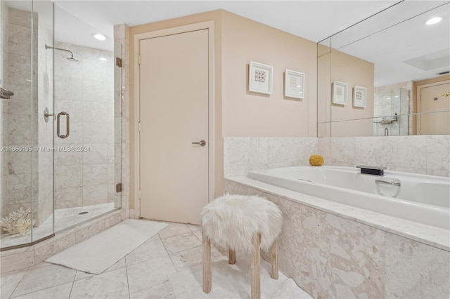 bathroom featuring tile patterned floors and plus walk in shower