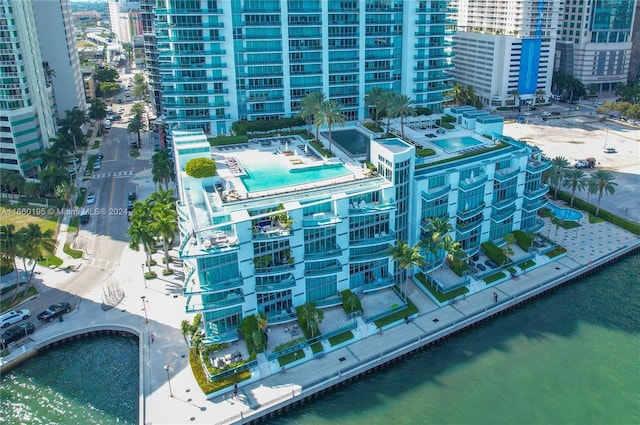 birds eye view of property featuring a water view