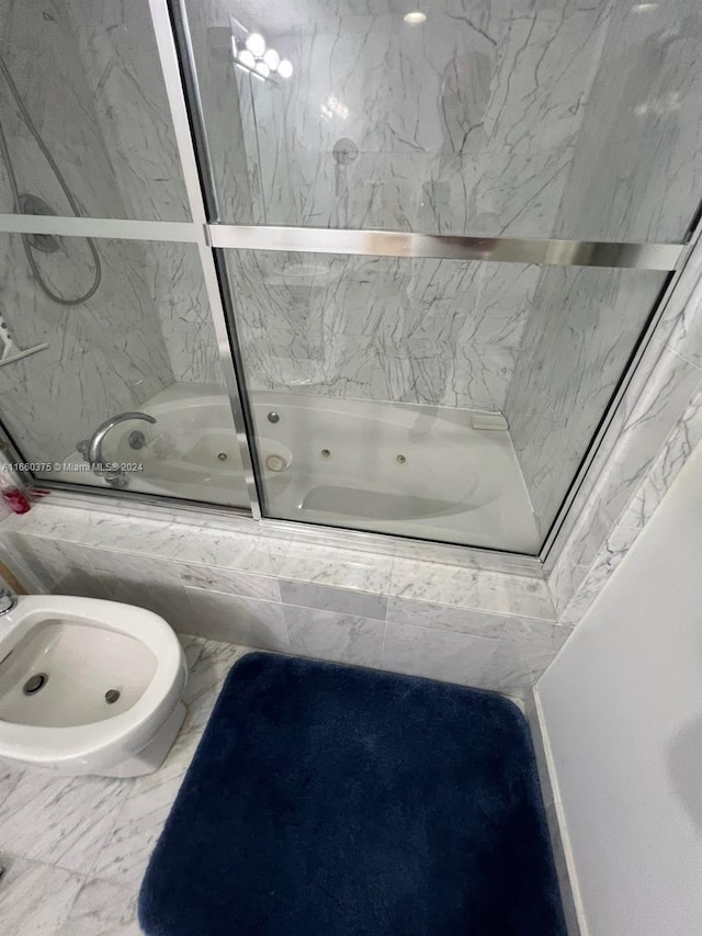 bathroom featuring tiled shower / bath combo