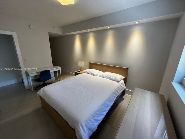 bedroom featuring wood-type flooring