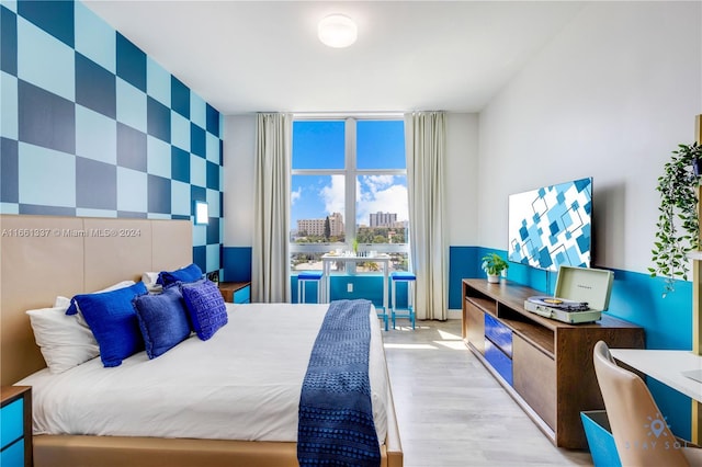 bedroom featuring light hardwood / wood-style floors