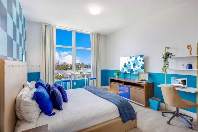 bedroom featuring light hardwood / wood-style floors