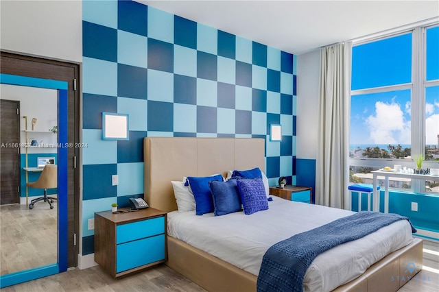 bedroom featuring light hardwood / wood-style flooring