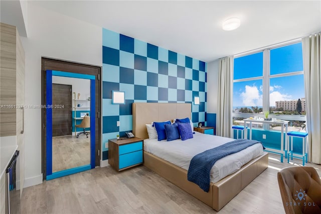 bedroom with light wood-type flooring