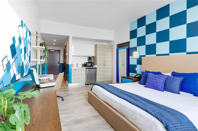 bedroom featuring light hardwood / wood-style flooring