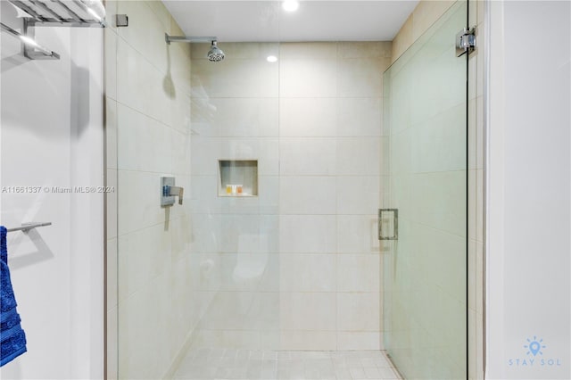 bathroom featuring an enclosed shower