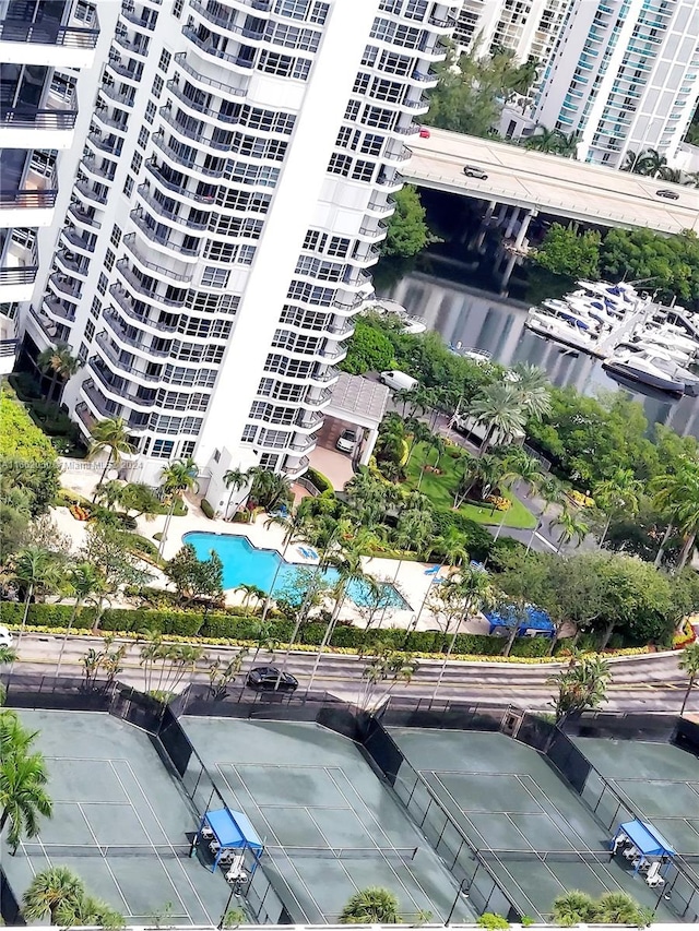 birds eye view of property with a water view